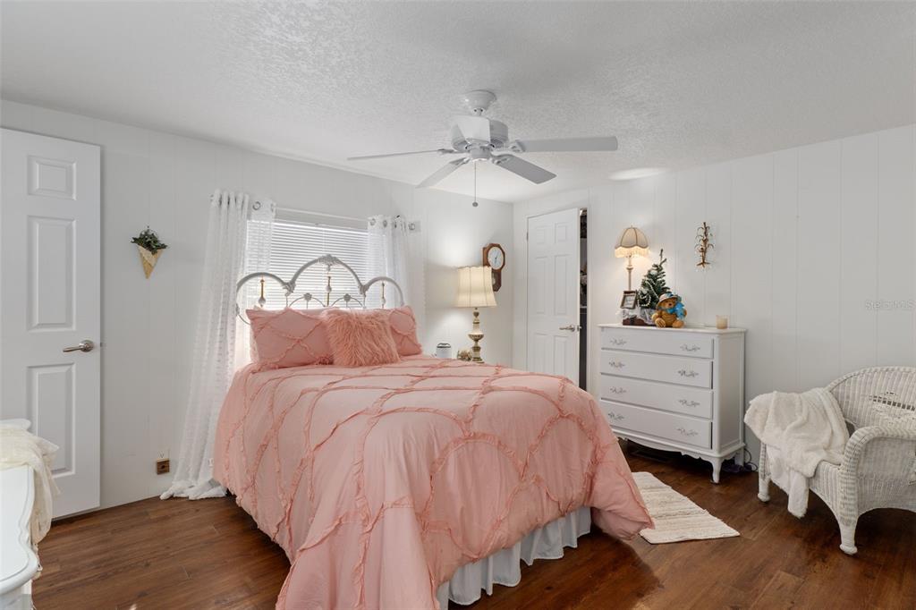 8197 Fiesta Street Brooksville, FL 34613 - Photo 23 of 49 a bedroom with a bed and a dresser