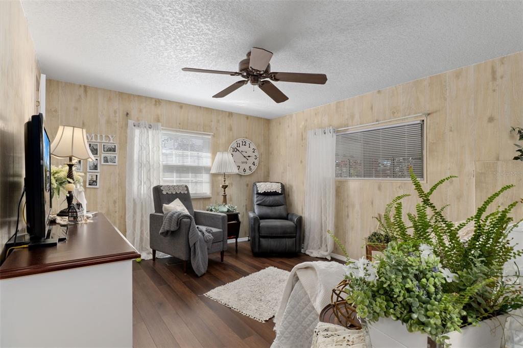 8197 Fiesta Street Brooksville, FL 34613 - Photo 28 of 49 a living room with furniture and a window