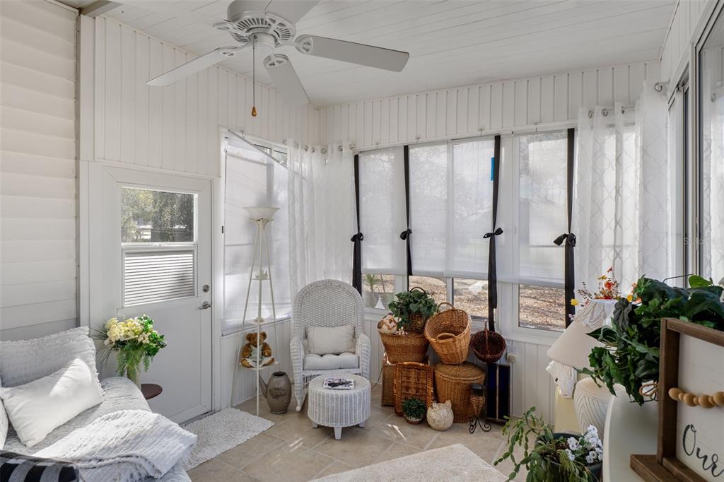 8197 Fiesta Street Brooksville, FL 34613 - Photo 38 of 49 a living room with furniture and a large window