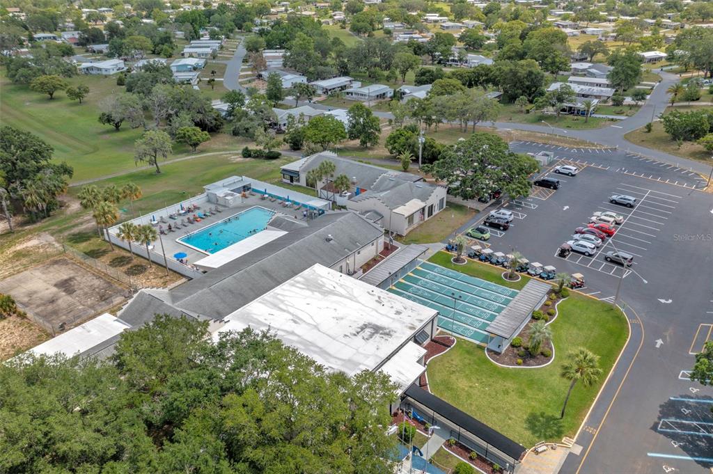 8197 Fiesta Street Brooksville, FL 34613 - Photo 43 of 49 an aerial view of a house with a garden