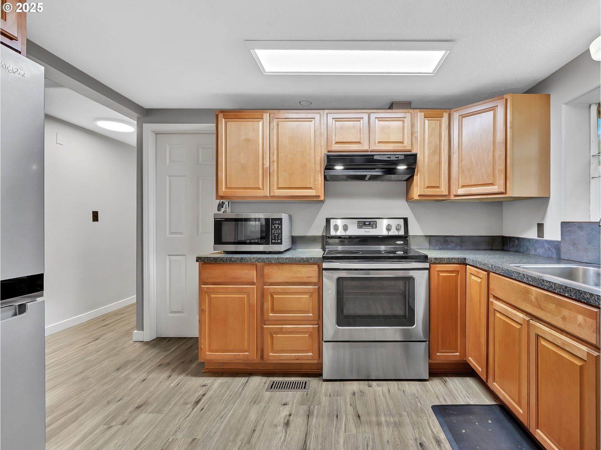 23754 South Bard Road Estacada, OR 97023 - Photo 11 of 39 a kitchen with stainless steel appliances granite countertop a stove and a refrigerator