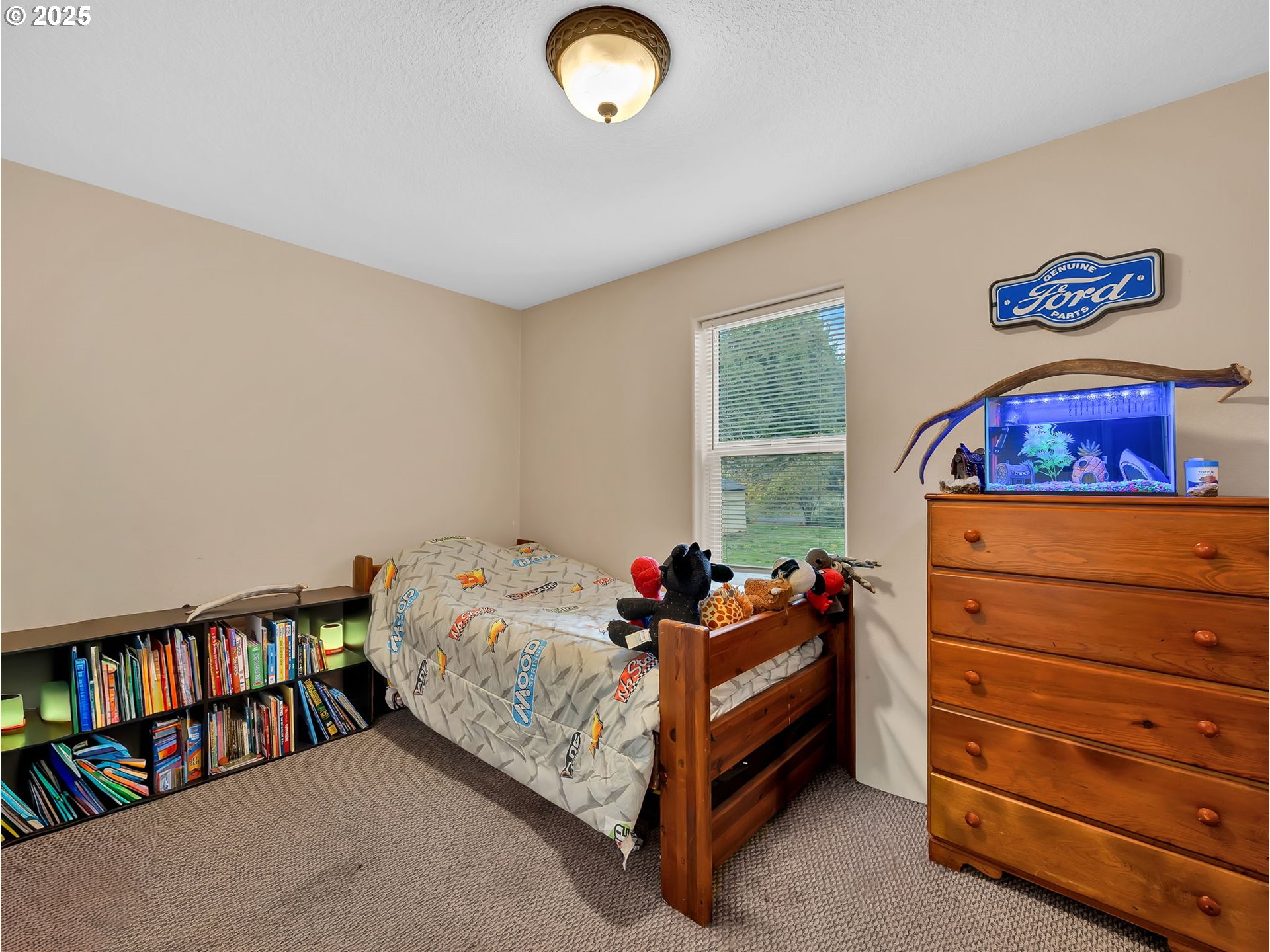 23754 South Bard Road Estacada, OR 97023 - Photo 17 of 39 a bed room with a bed and a book shelf