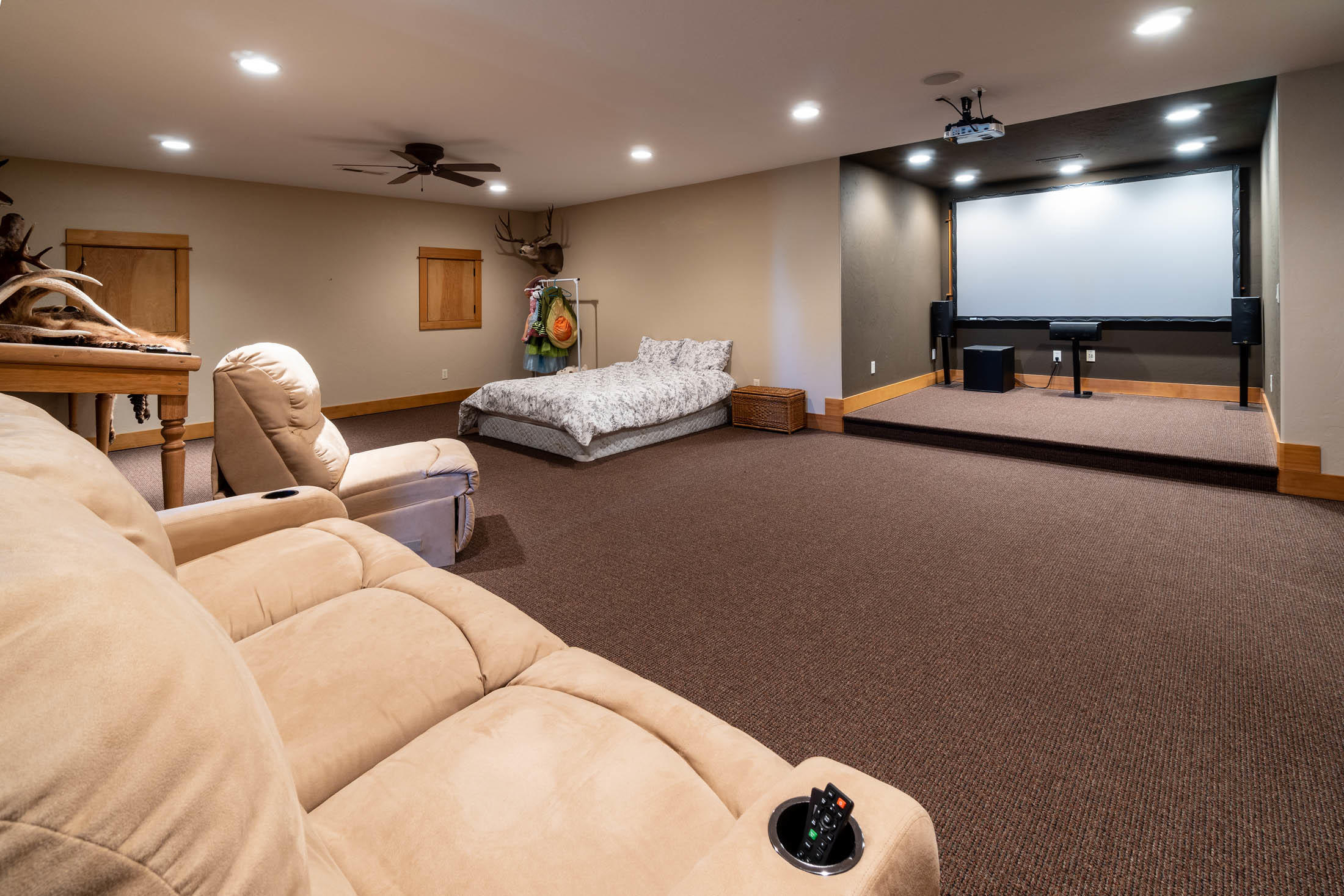 63575 Cricketwood Road Bend, OR 97701 - Photo 21 of 53 a living room with furniture and a mirror