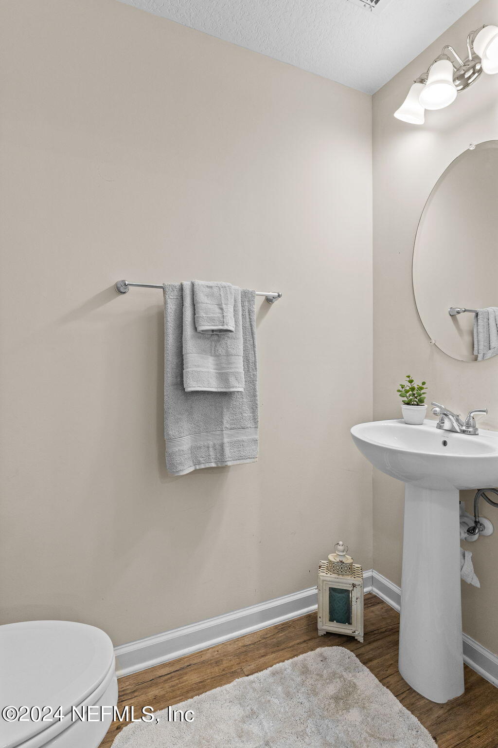 3341 Chestnut Ridge Way Orange Park, FL 32065 - Photo 11 of 37 Half bathroom down stairs