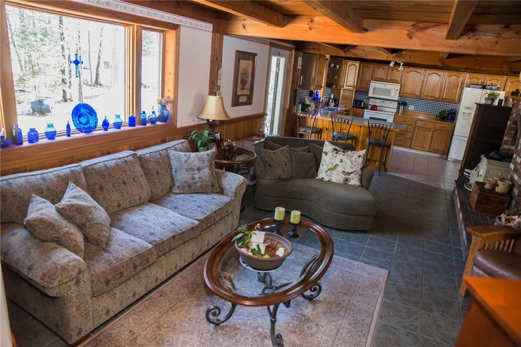 30 Abenaki Acres Road Naples, ME 04055 - Photo 4 of 35 Living Room; Picture Window; Tile...