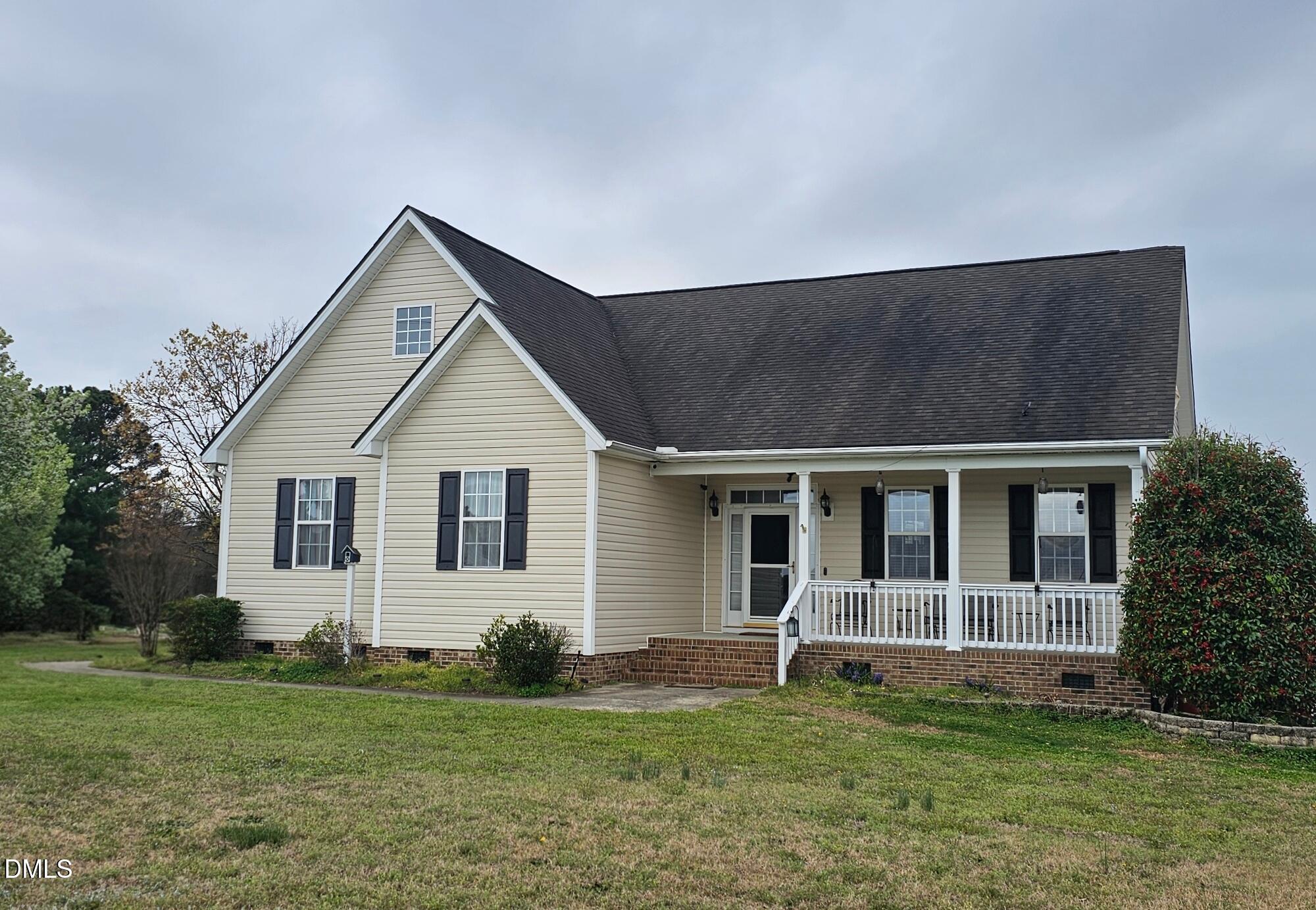 40 Wild Winds Drive Coats, NC 27521 - Photo 1 of 26 front view of a house with a yard