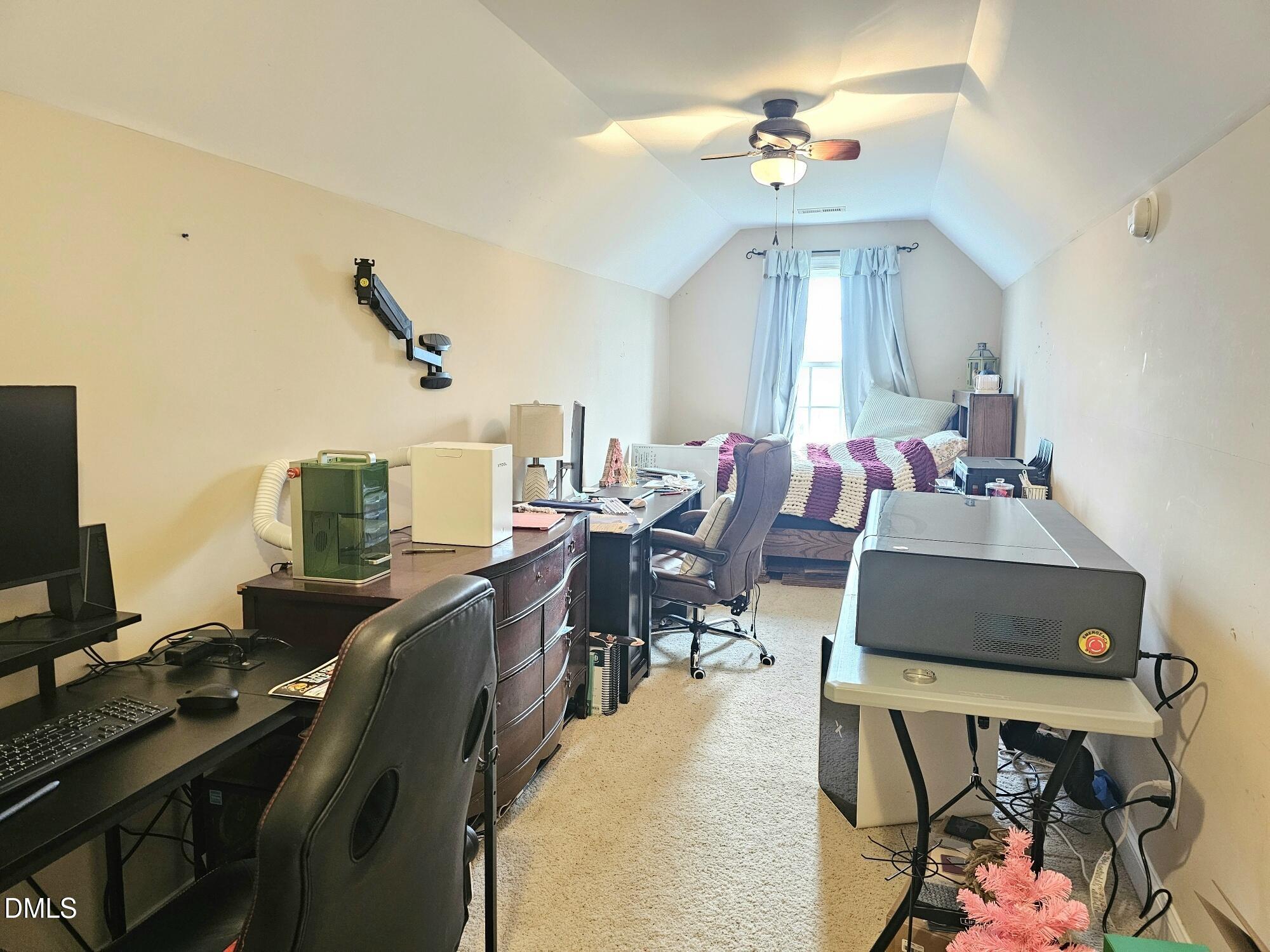 40 Wild Winds Drive Coats, NC 27521 - Photo 19 of 26 a view of a workspace with furniture and a chandelier