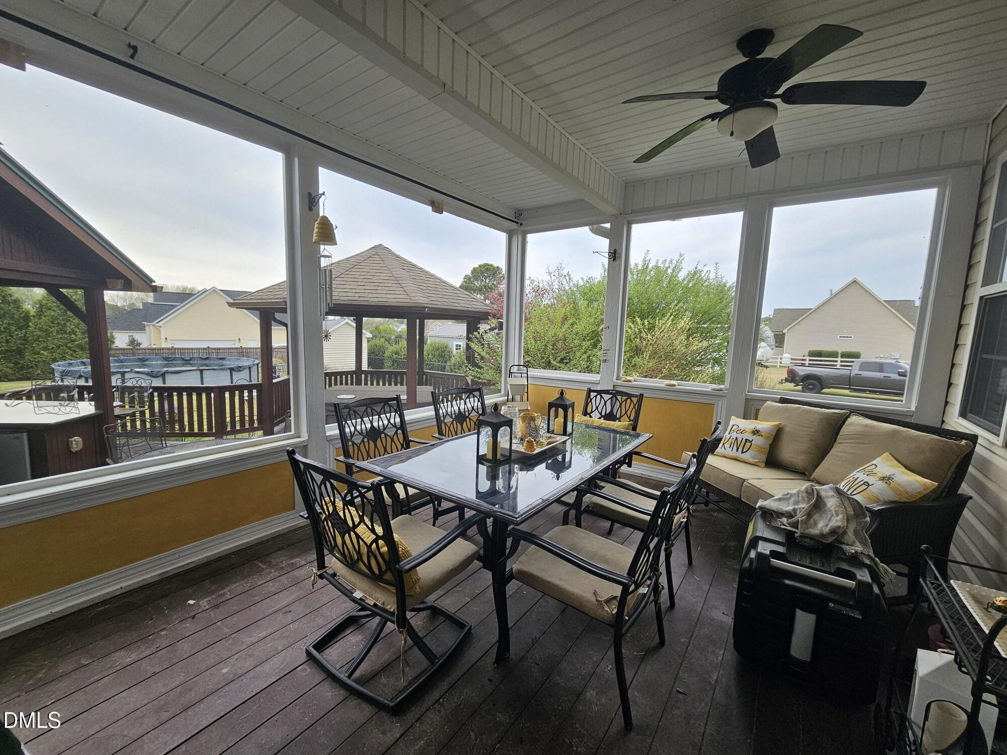 40 Wild Winds Drive Coats, NC 27521 - Photo 20 of 26 a view of a dining room with furniture window and outside view