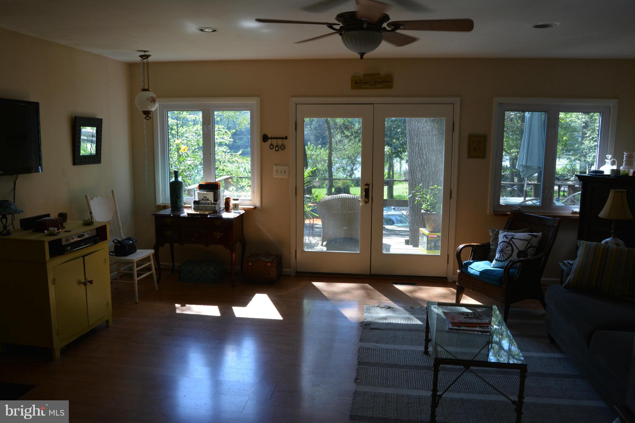 348 Ridge Road Pasadena, MD 21122 - Photo 19 of 27 a living room with furniture and a window