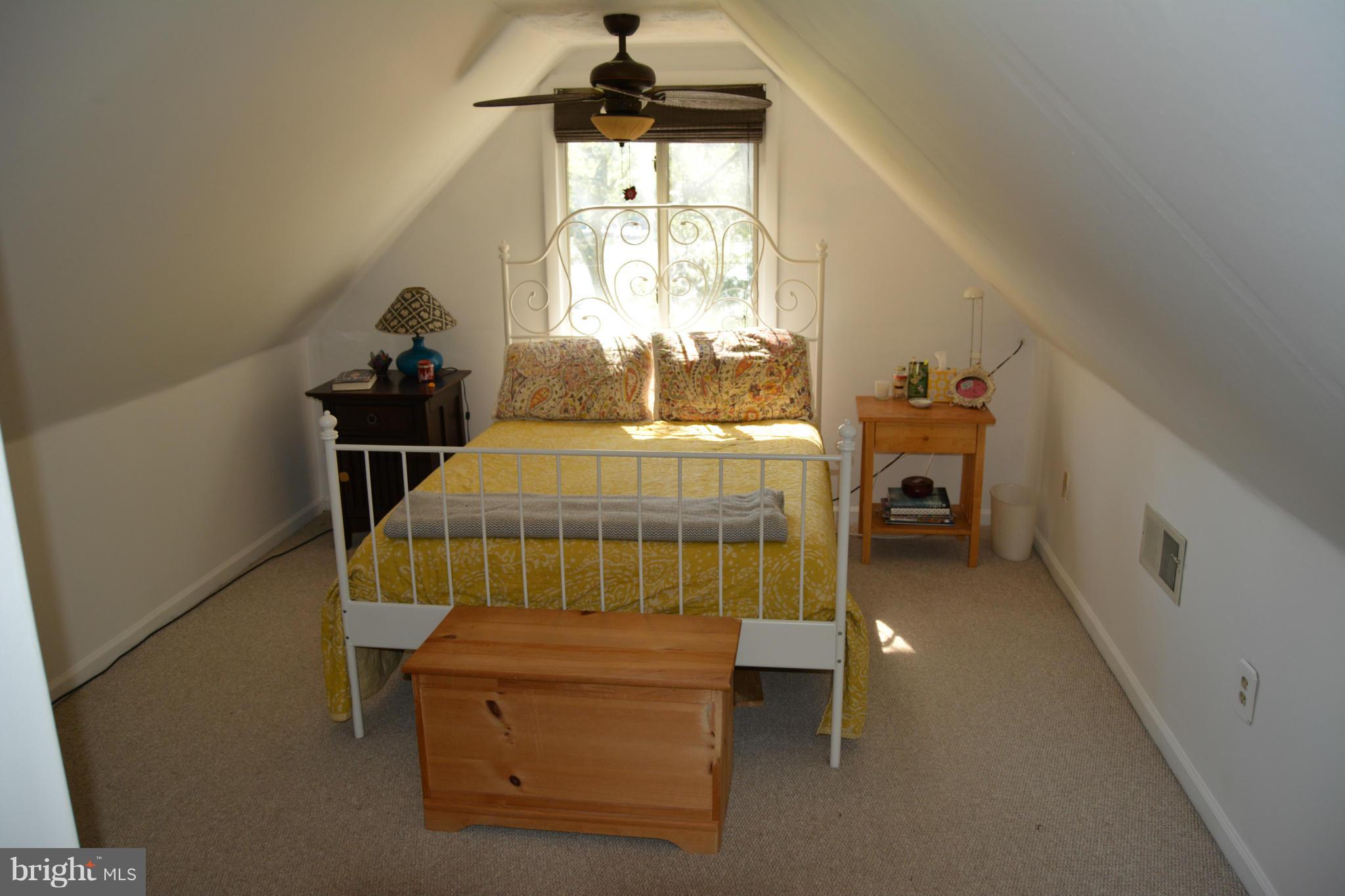348 Ridge Road Pasadena, MD 21122 - Photo 21 of 27 a bedroom with a bed and a window