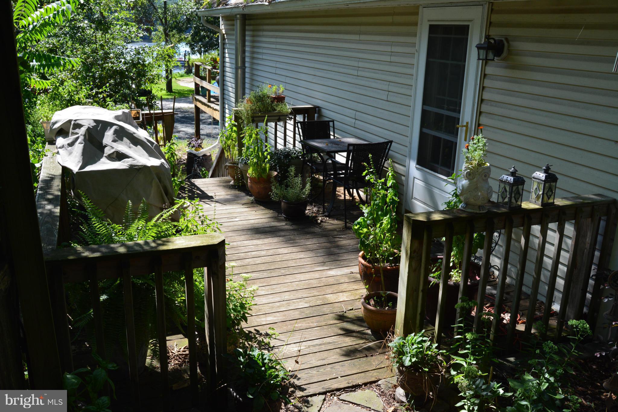 348 Ridge Road Pasadena, MD 21122 - Photo 6 of 27 a view of a porch with furniture