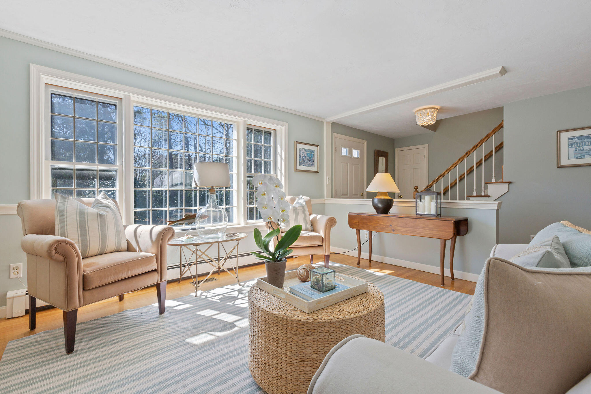 89 Screecham Way Cotuit, MA 02635 - Photo 7 of 50 a living room with furniture and a large window