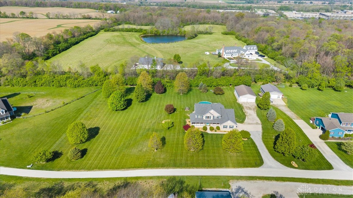 841 Willow Road Springfield, OH 45502 - Photo 51 of 64 An aerial view showcases a residential property with a private pool and expansive green grounds.