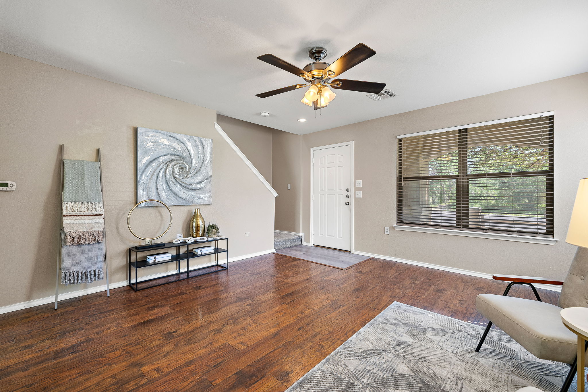 5705 Viewpoint Drive Austin, TX 78744 - Photo 4 of 30 Light-filled living spaces with room to relax, entertain, and make it your own.
