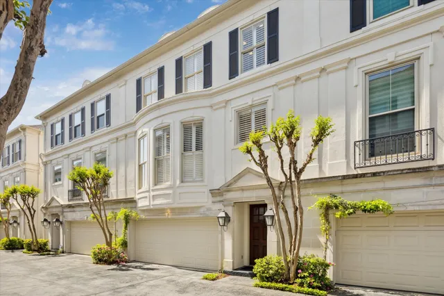 a front view of a multi story residential apartment building