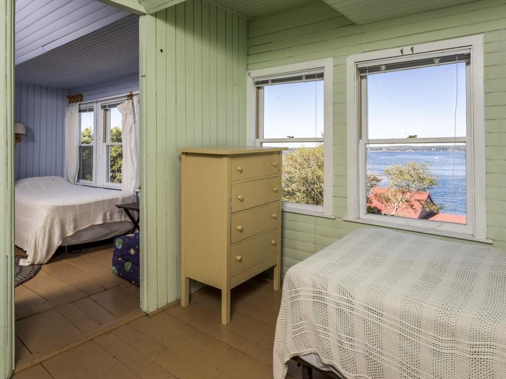 153-260 Van Horn Road East Boothbay, ME 04544 - Photo 20 of 25 Guest bedroom with with painted pine...