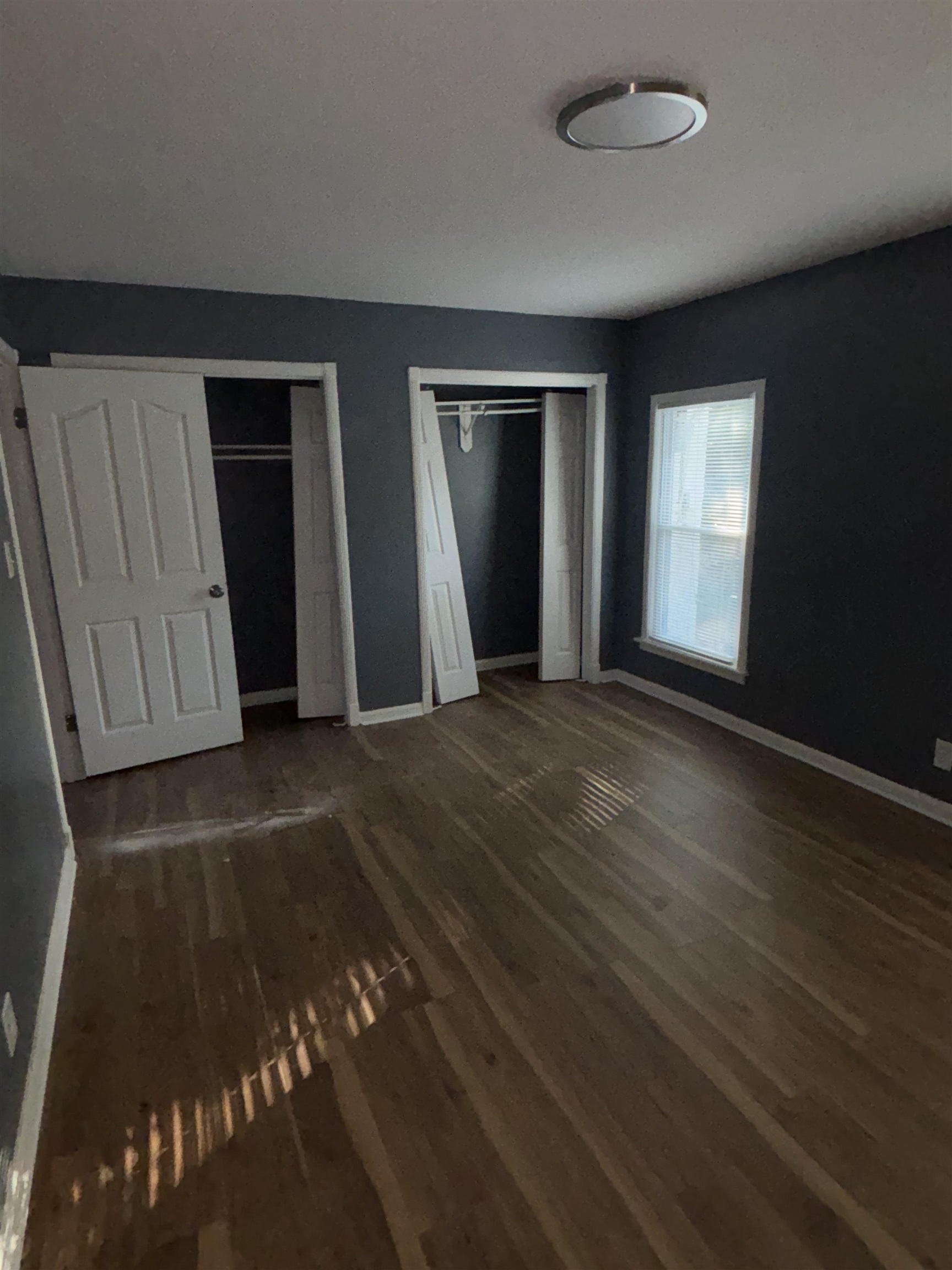 1157 Prescott Road Memphis, TN 38111 - Photo 13 of 31 an empty room with windows