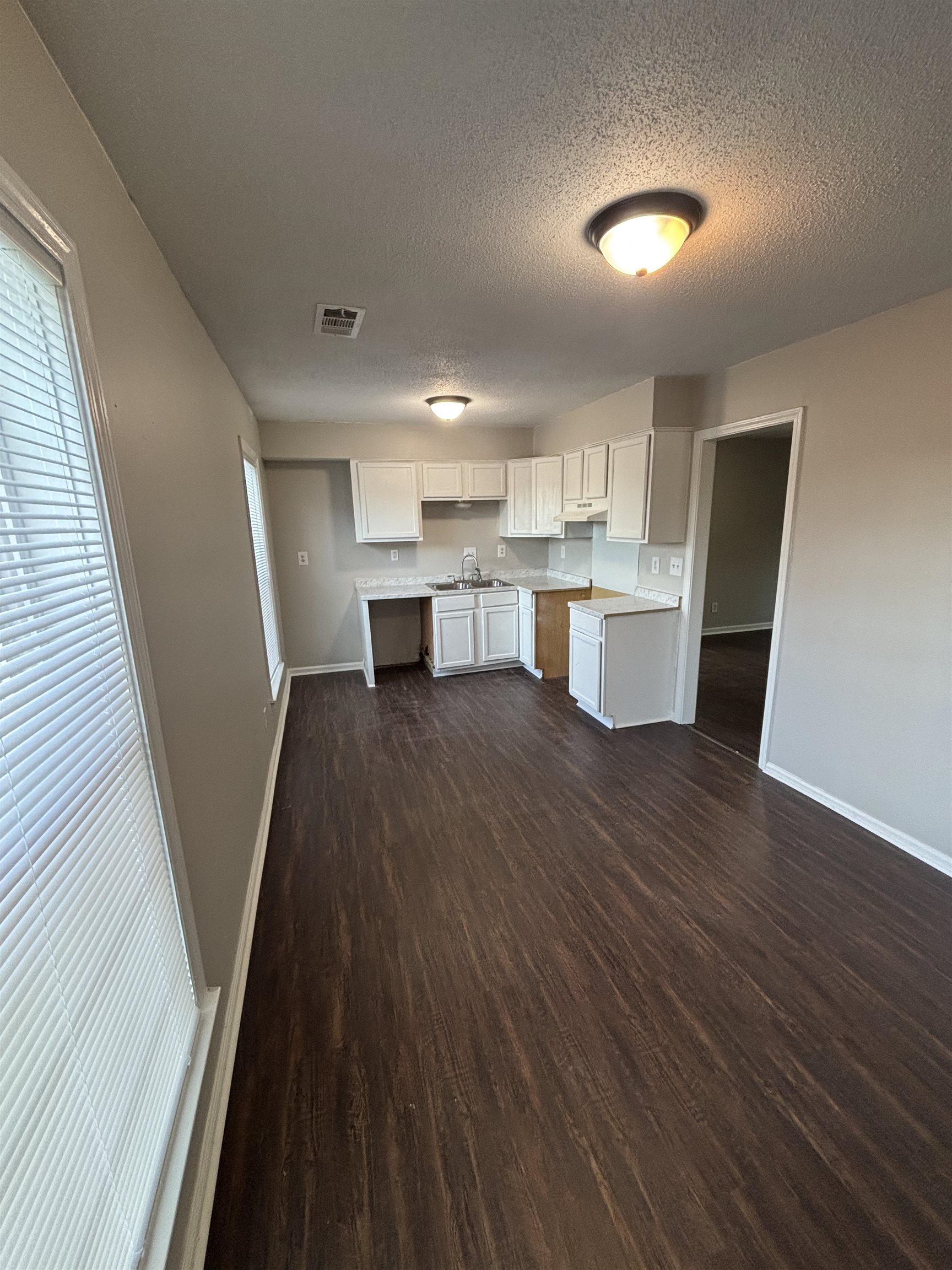 1157 Prescott Road Memphis, TN 38111 - Photo 29 of 31 a view of kitchen and wooden floor