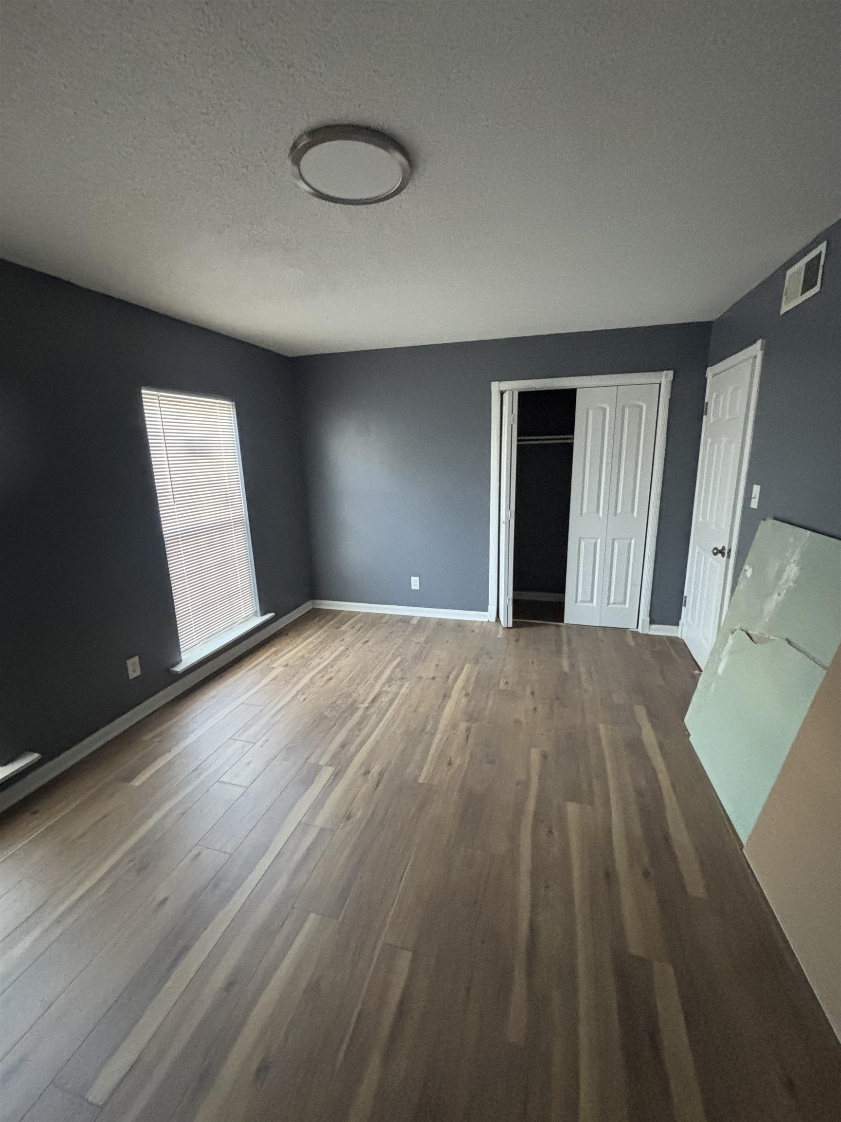 1157 Prescott Road Memphis, TN 38111 - Photo 7 of 31 a view of a livingroom with wooden floor