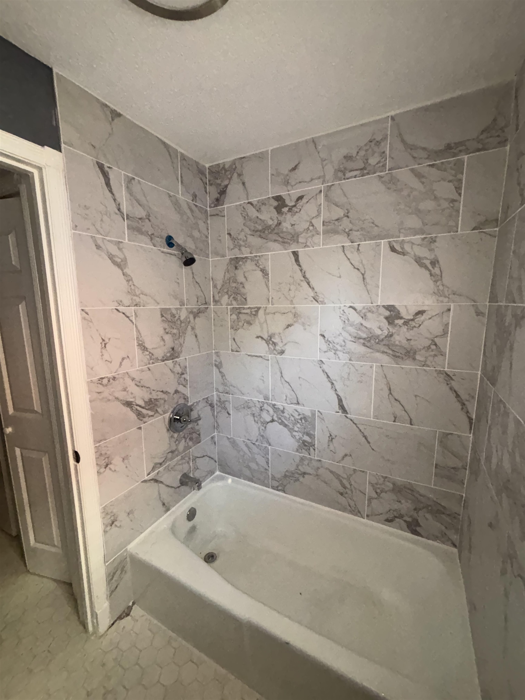 1157 Prescott Road Memphis, TN 38111 - Photo 10 of 31 a bathroom with a bathtub and shower