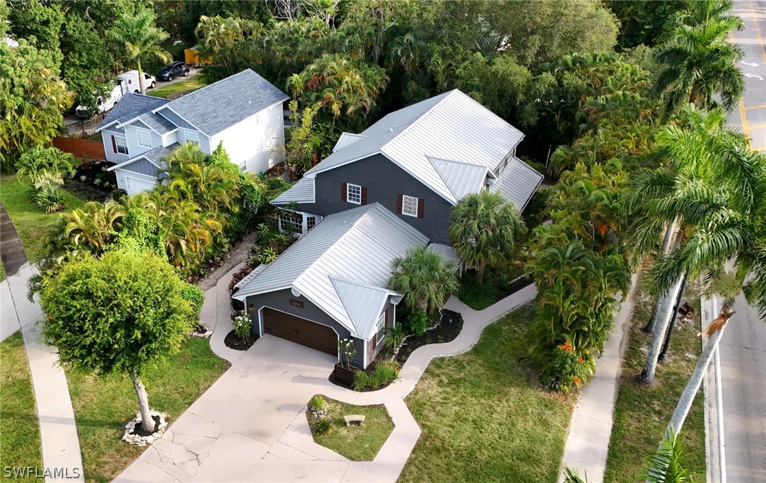 an aerial view of a house with garden