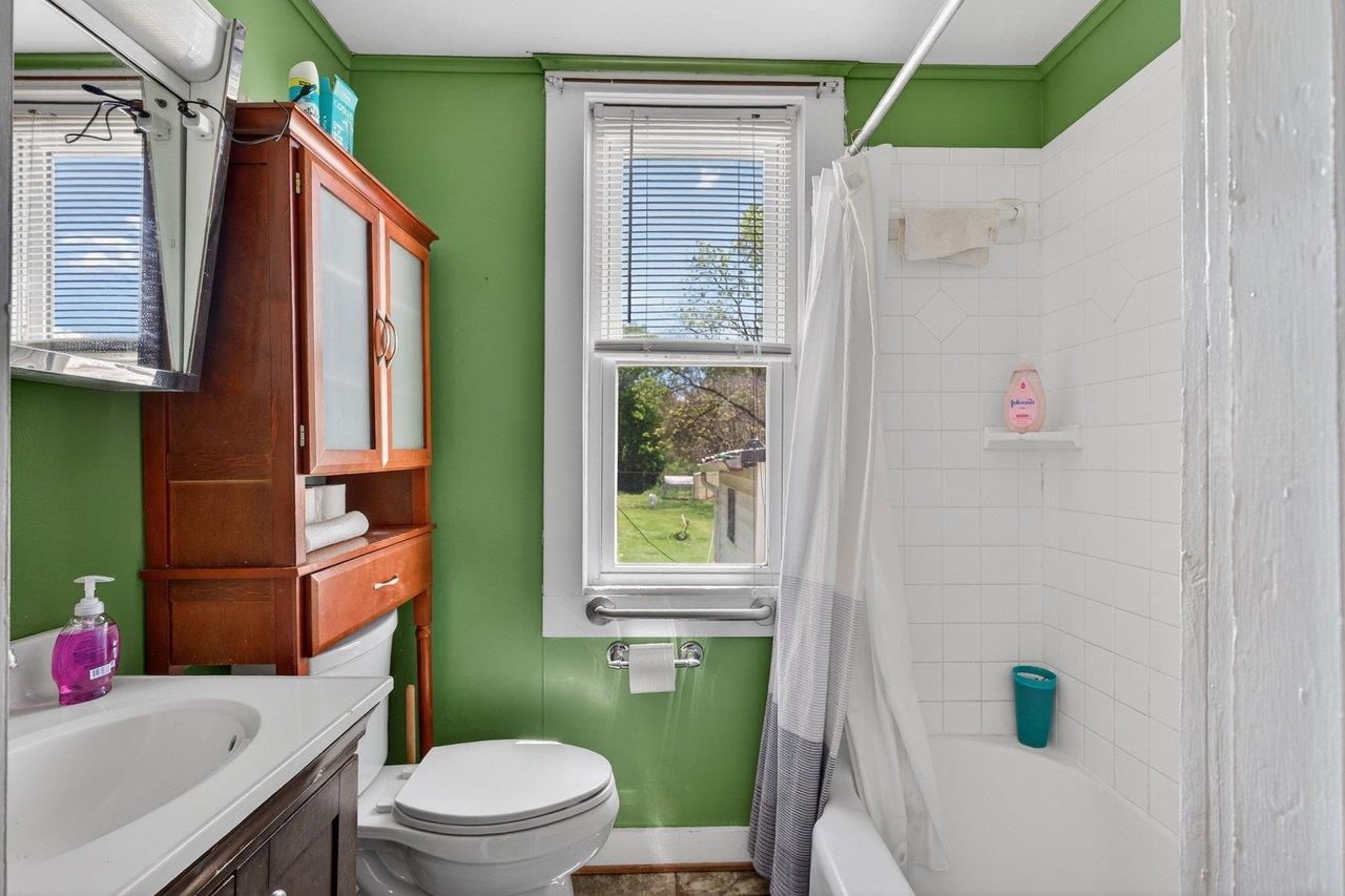 724 Newtown Road Elkton, VA 22827 - Photo 18 of 38 a bathroom with a sink toilet and shower