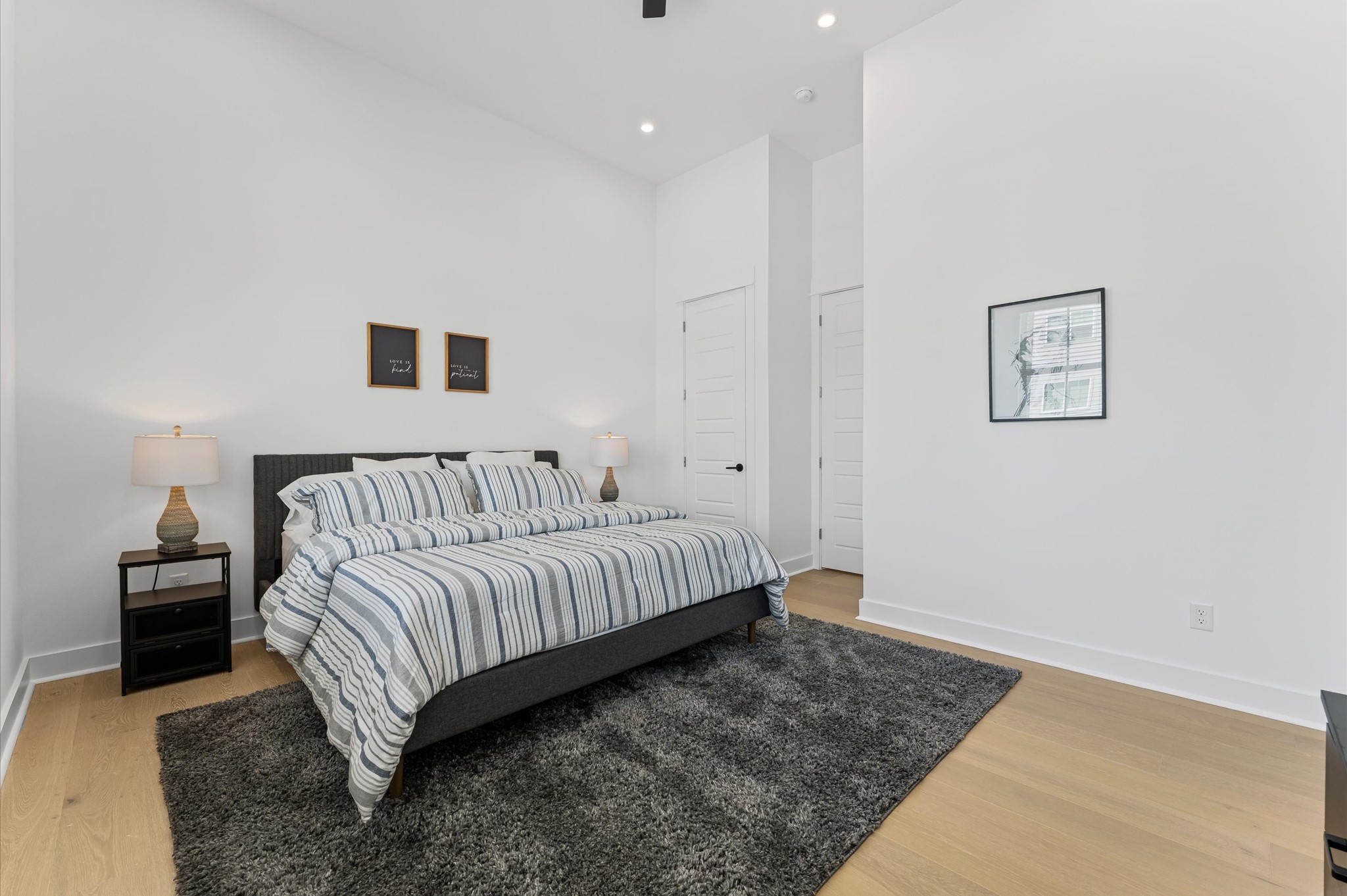 2424 Freeman Street Houston, TX 77009 - Photo 23 of 43 Bright and spacious, the primary bedroom features multiple windows, a large walk-in closet, and a luxurious primary bathroom... your private retreat.