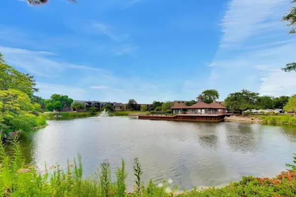 a view of a lake with a houses