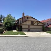 a house view with a outdoor space