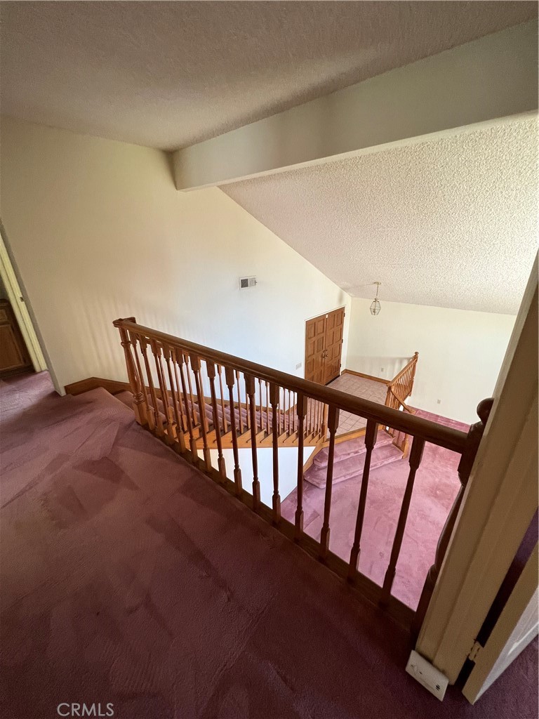 5650 Los Robles La Verne, CA 91750 - Photo 12 of 20 a view of a hallway with staircase