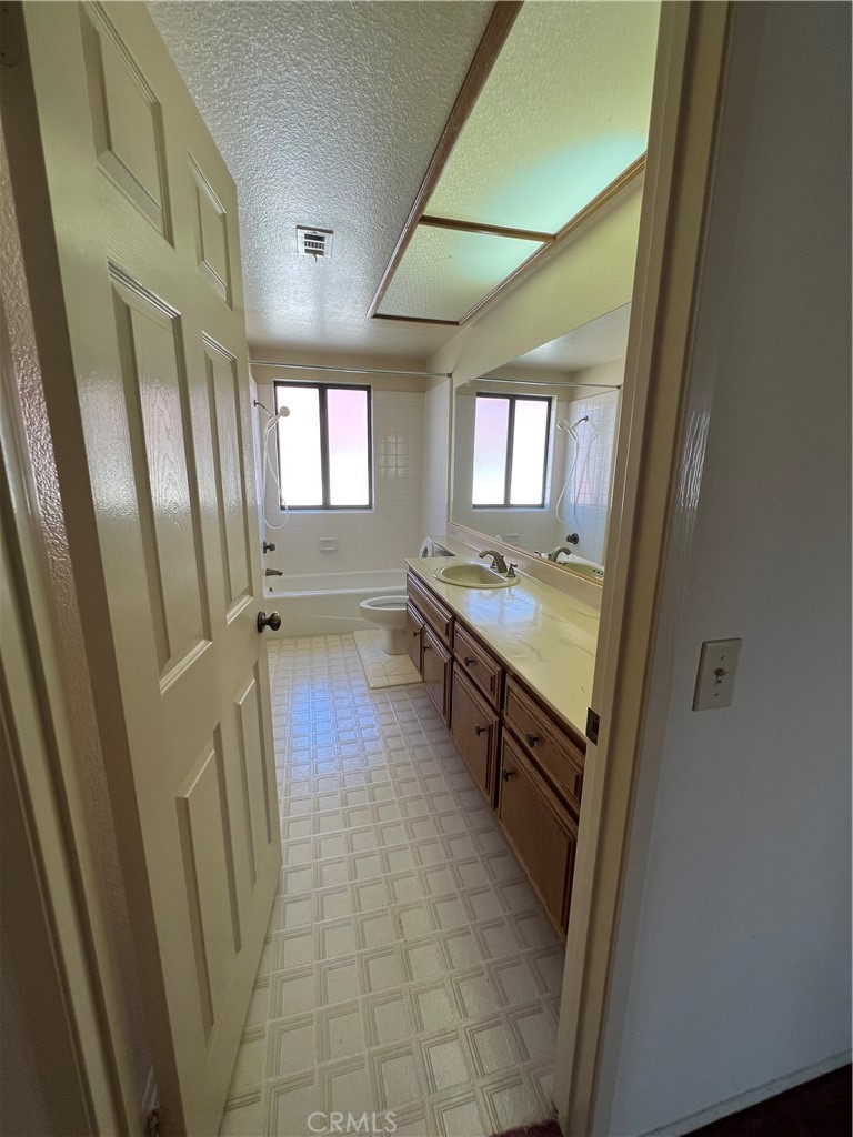 5650 Los Robles La Verne, CA 91750 - Photo 13 of 20 a view of a hallway with furniture and window