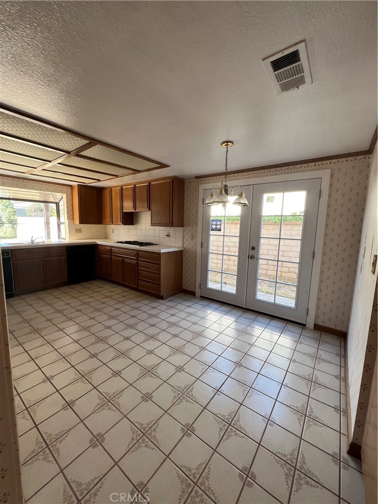 5650 Los Robles La Verne, CA 91750 - Photo 2 of 20 a large white kitchen with a large window