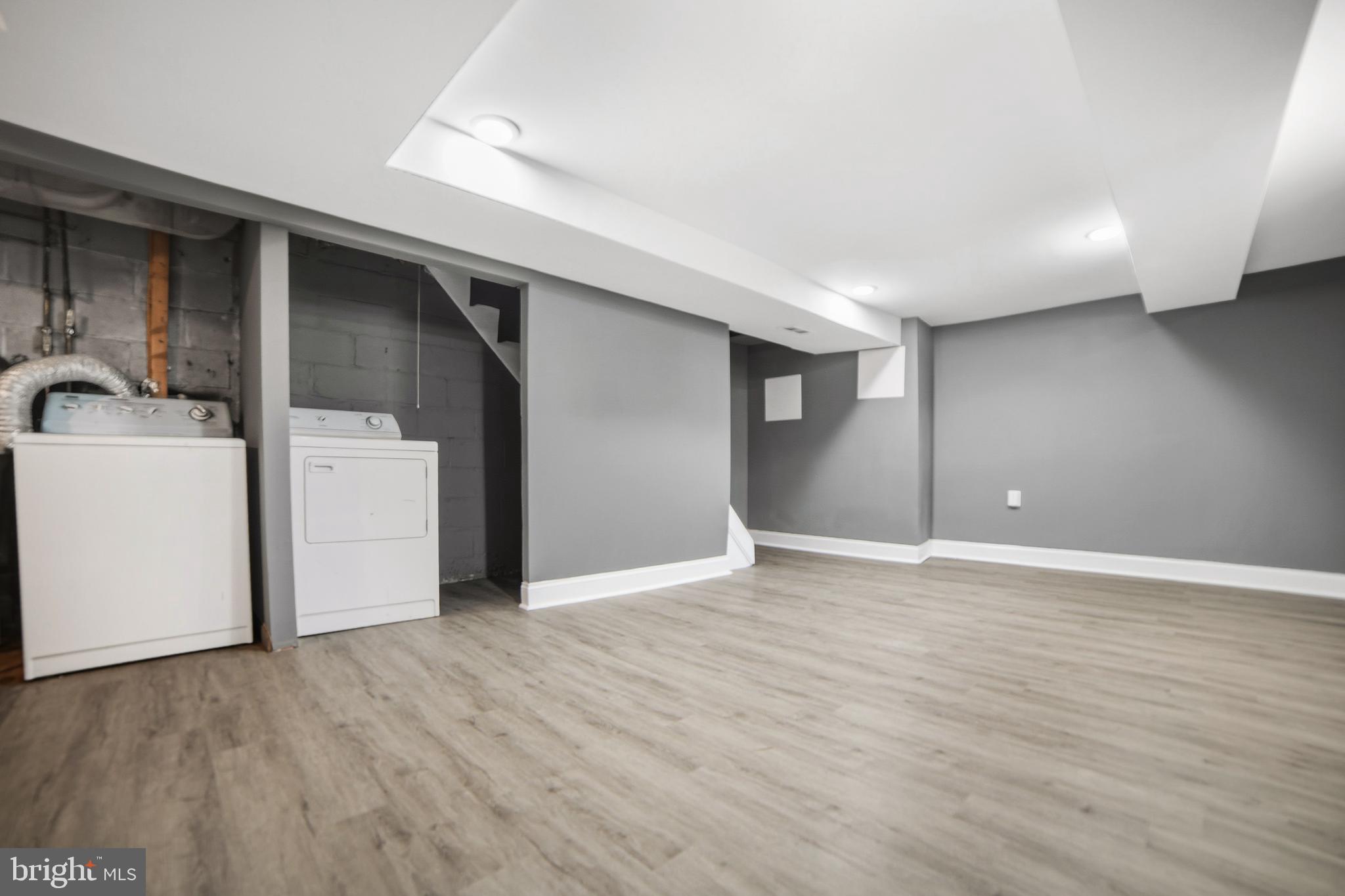 4434 Manorview Road Baltimore, MD 21229 - Photo 23 of 34 a view of empty room with wooden floor