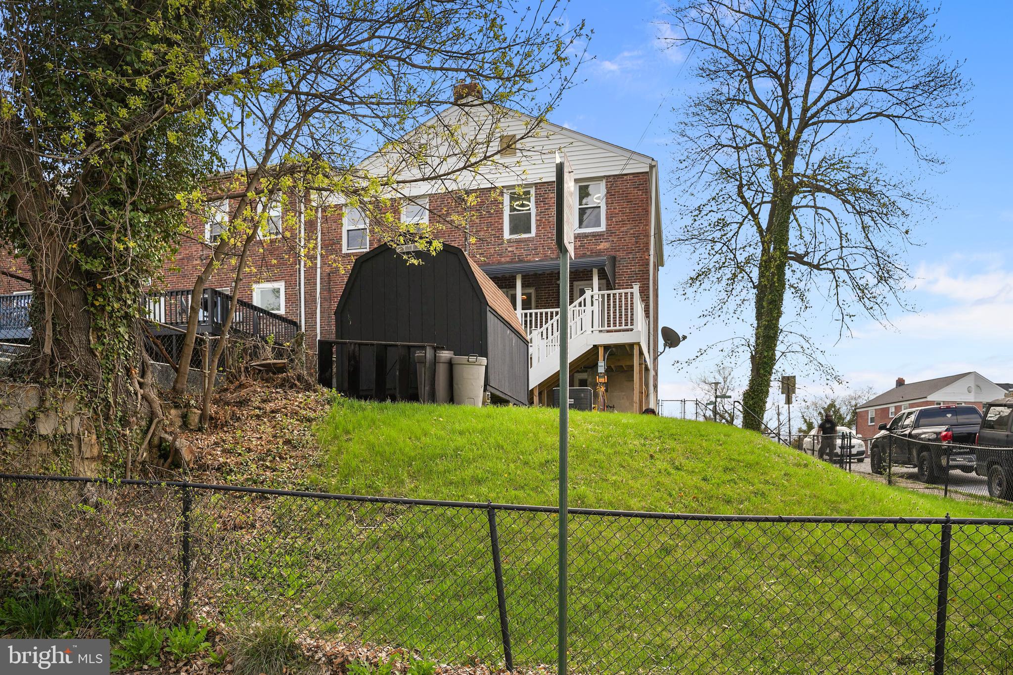 4434 Manorview Road Baltimore, MD 21229 - Photo 34 of 34 a front view of a house with a yard