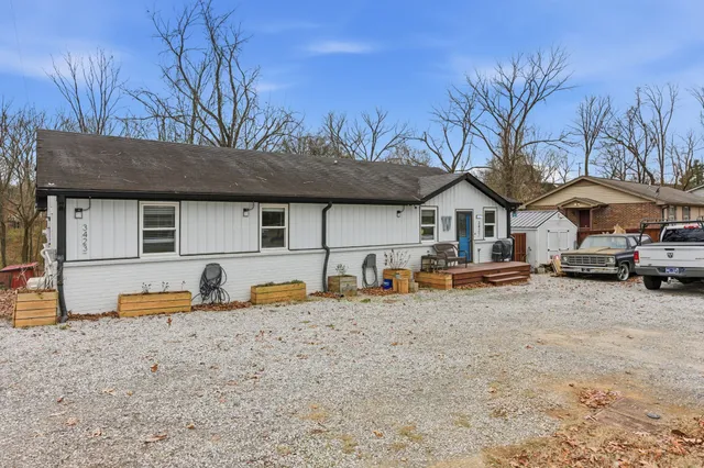 a house view with a backyard space