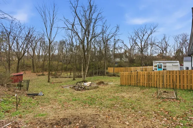a backyard of a house with lots of green space
