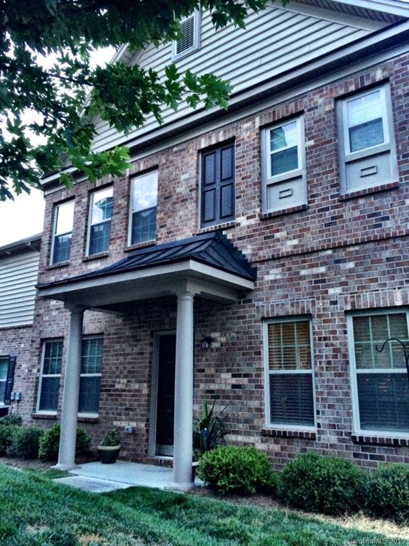 14713 Intermilan Way Charlotte, NC 28277 - Photo 2 of 16 a brick building with a large windows