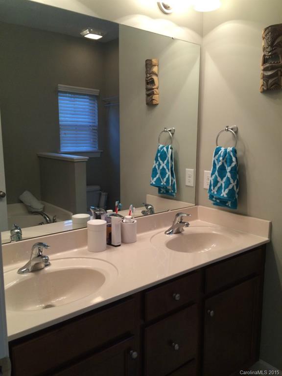 14713 Intermilan Way Charlotte, NC 28277 - Photo 13 of 16 a bathroom with double sink and a mirror