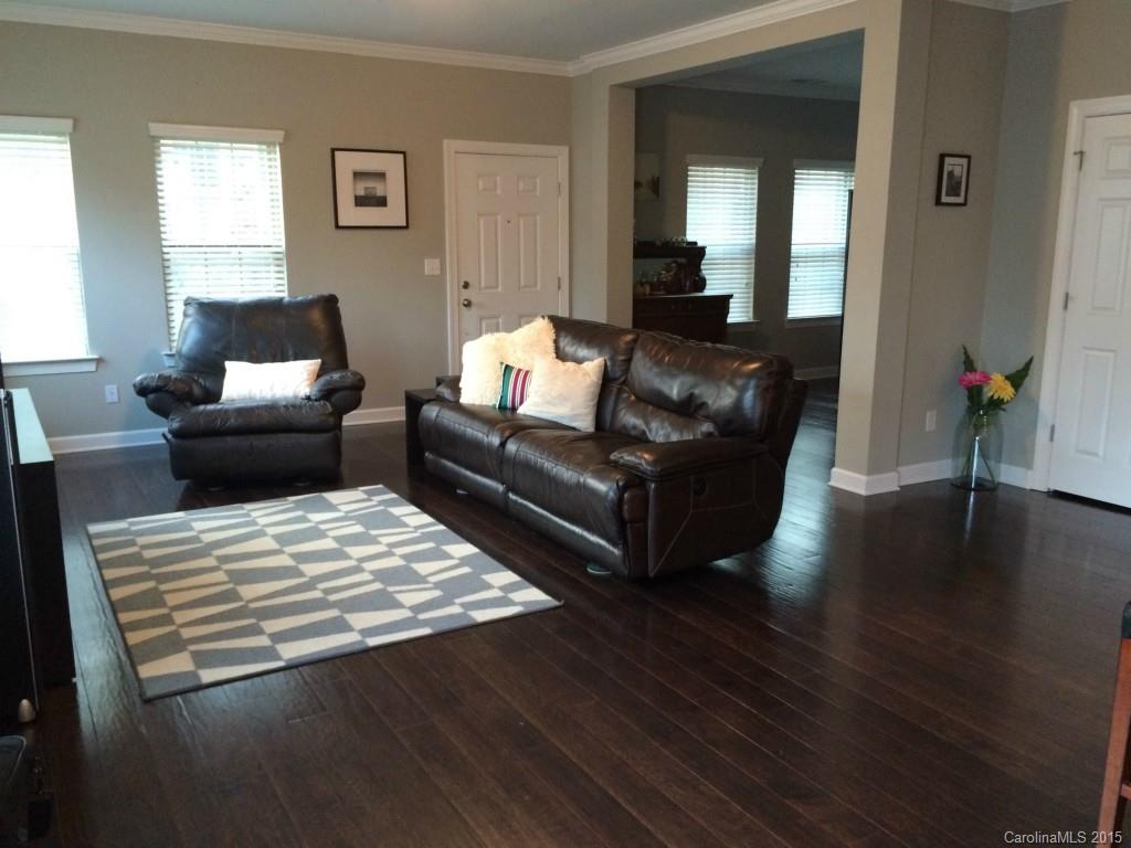 14713 Intermilan Way Charlotte, NC 28277 - Photo 6 of 16 a living room with furniture and a wooden floor