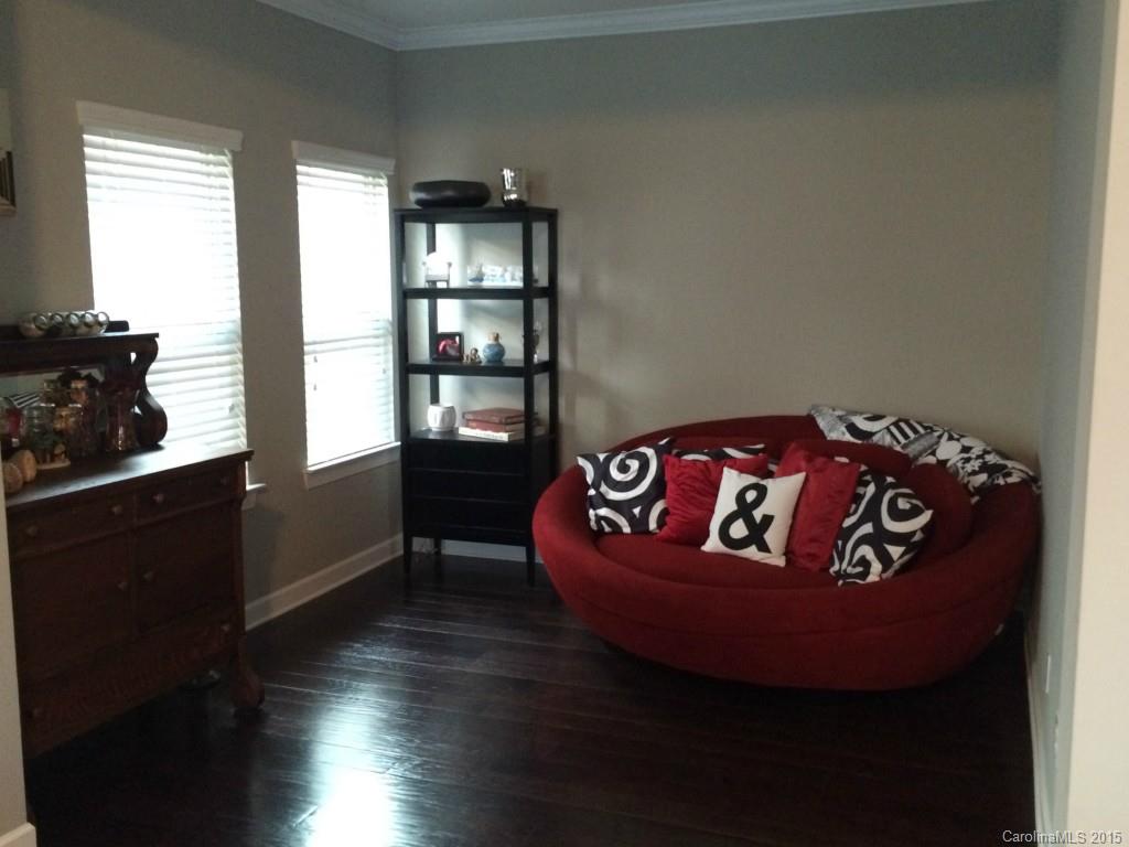 14713 Intermilan Way Charlotte, NC 28277 - Photo 7 of 16 a bed sitting in a bedroom next to a window