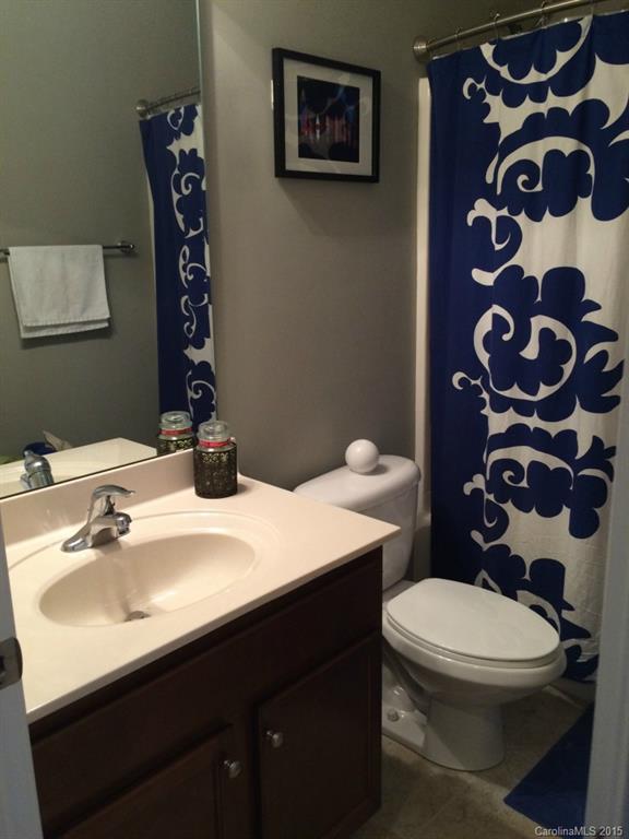 14713 Intermilan Way Charlotte, NC 28277 - Photo 9 of 16 a bathroom with a sink and a toilet