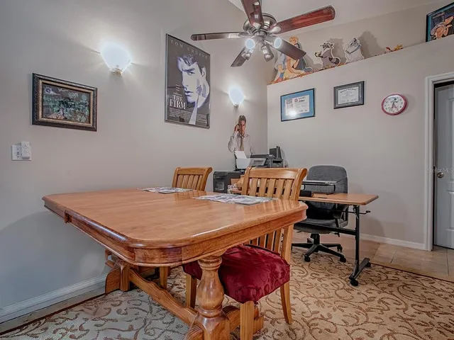 a view of a workspace with furniture