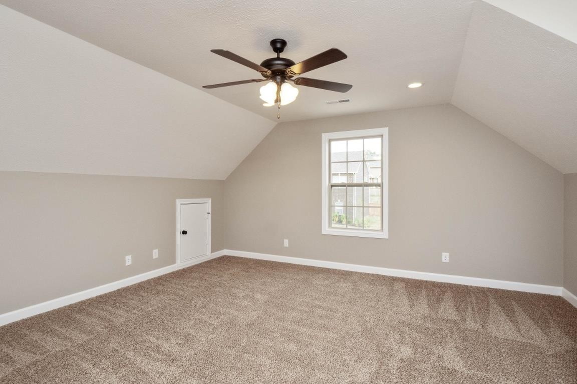 2459 Shadowood Road Clarksville, TN 37043 - Photo 13 of 15 a view of a livingroom with a ceiling fan and window