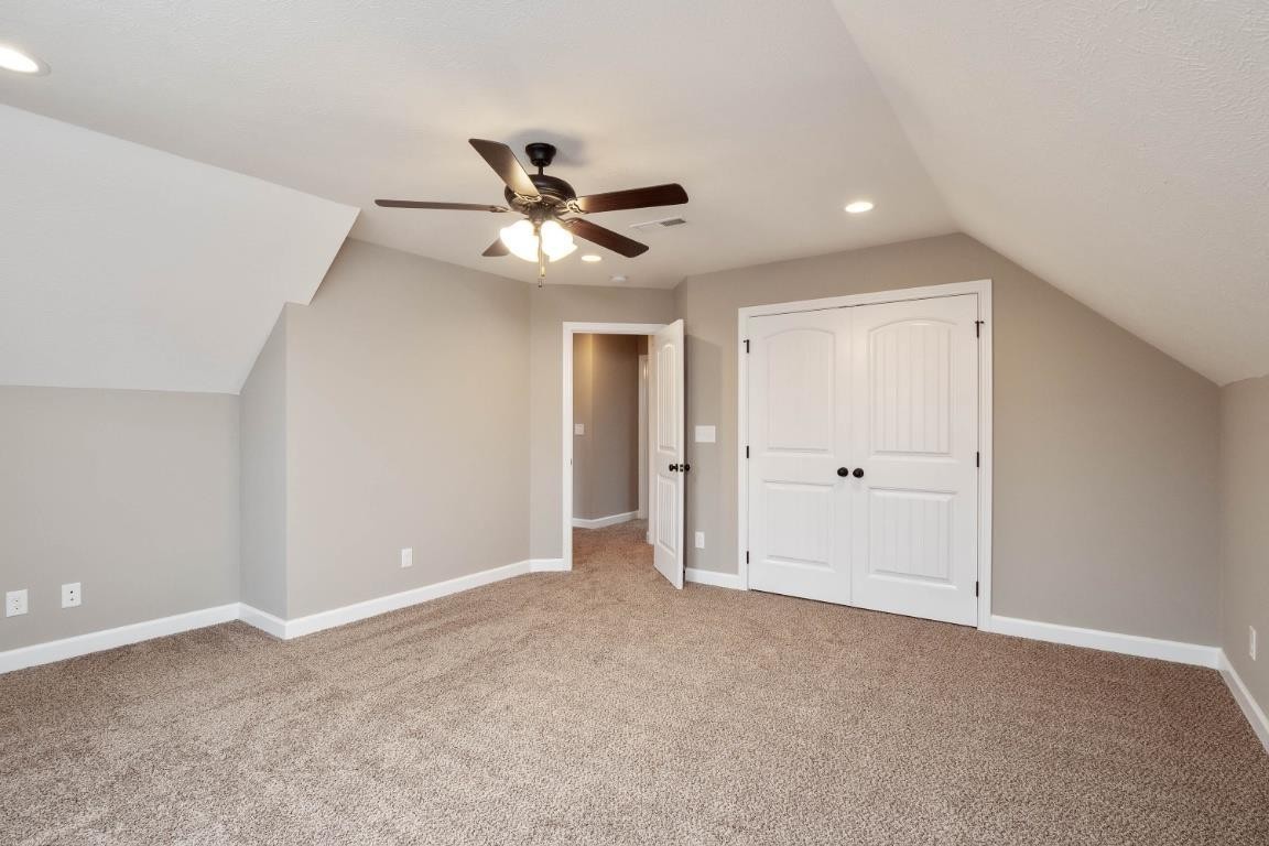 2459 Shadowood Road Clarksville, TN 37043 - Photo 14 of 15 a view of an empty room with a ceiling fan