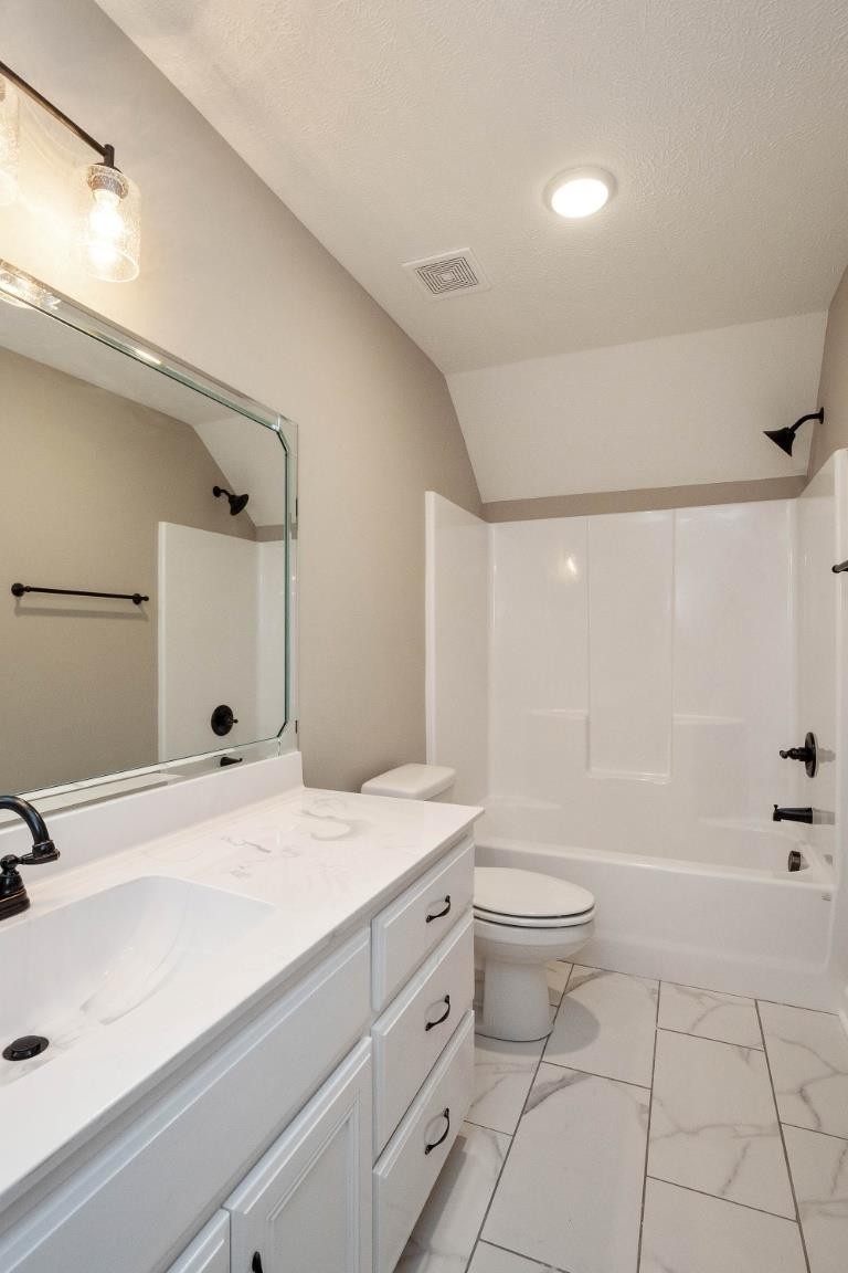 2459 Shadowood Road Clarksville, TN 37043 - Photo 15 of 15 a bathroom with a sink a toilet and shower