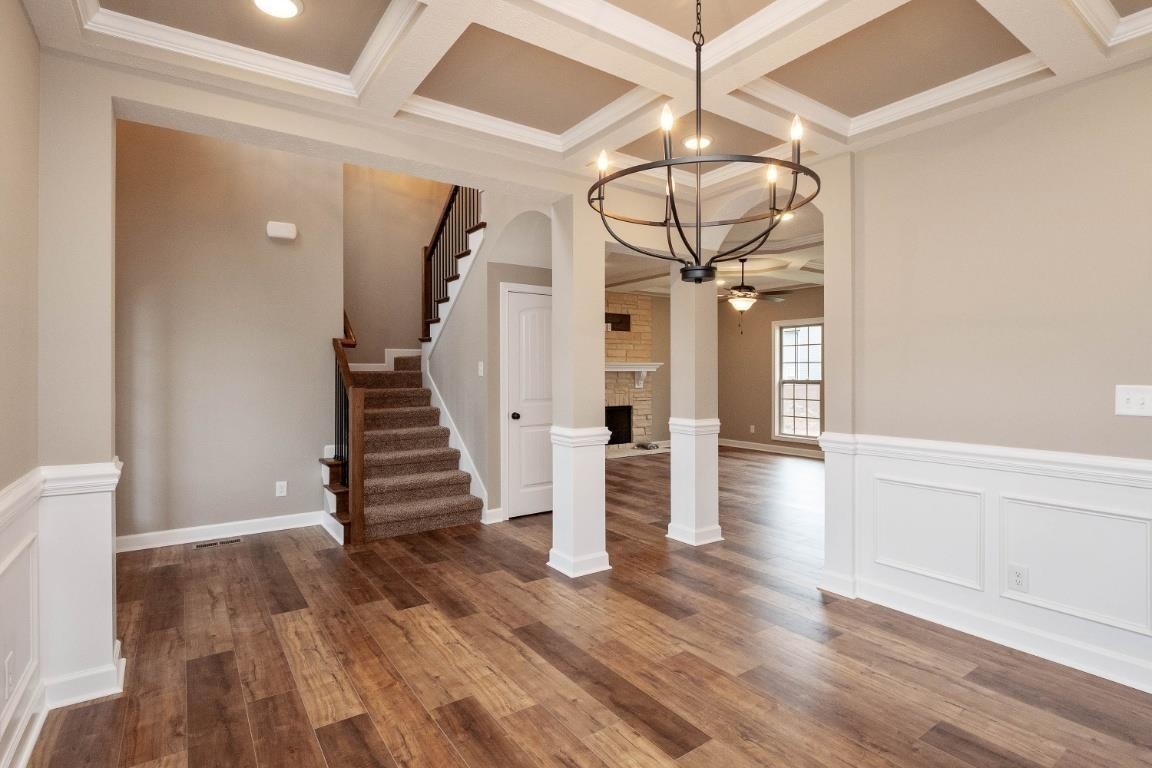 2459 Shadowood Road Clarksville, TN 37043 - Photo 3 of 15 a view of a hallway with wooden floor and staircase