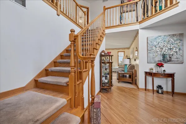 a view of entryway livingroom and hall