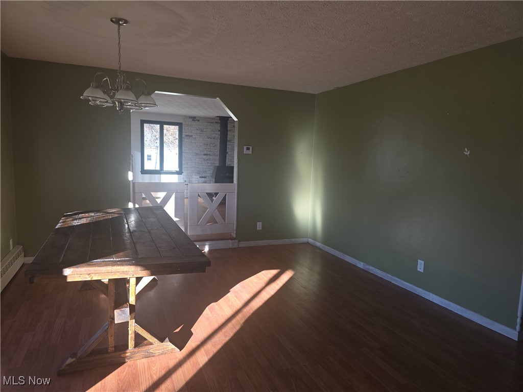 1254 Aberagg Road Atwater, OH 44201 - Photo 25 of 25 Dining area with bayed window. Open floor plan and hardwood floors.