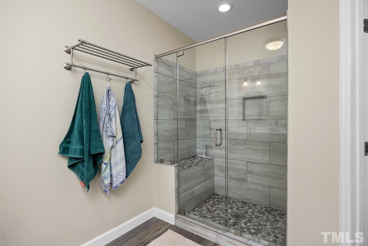 1008 Windstar Way Willow Spring, NC 27592 - Photo 20 of 51 a bathroom with a shower