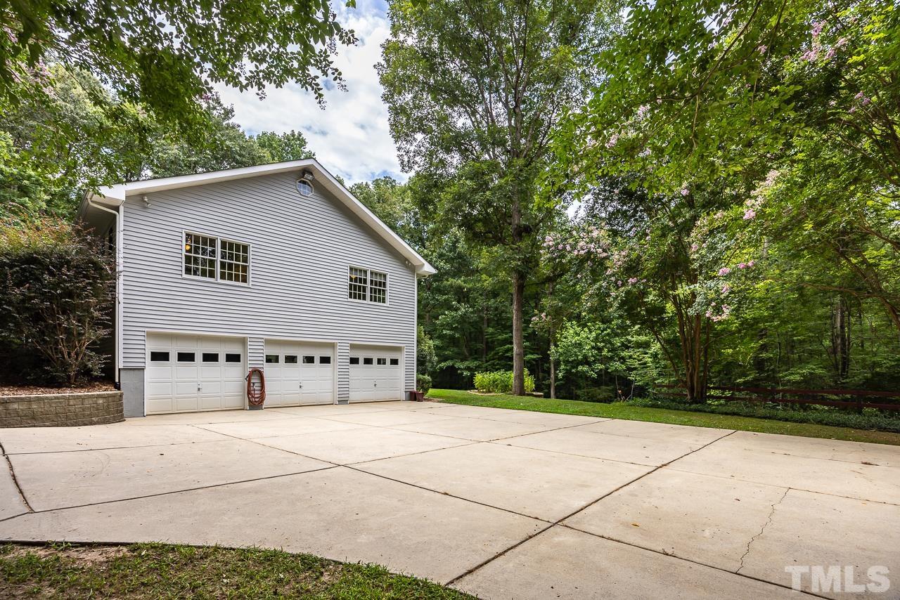 1008 Windstar Way Willow Spring, NC 27592 - Photo 29 of 51 a view of a house with a garage